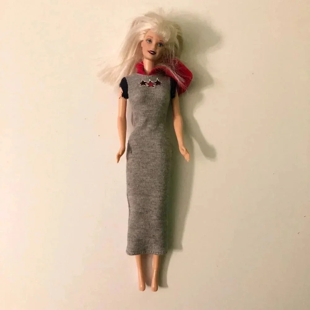 Barbie Doll Mattel Twist and Turn Bendable Knees China Grey Dress